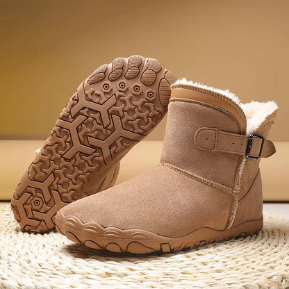 Gevoerde laarzen in kastanjebruin met zicht op de antislip barefoot-zool