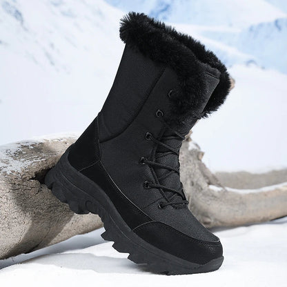 Snowboots dames – zijaanzicht met metalen ringen en profielzool