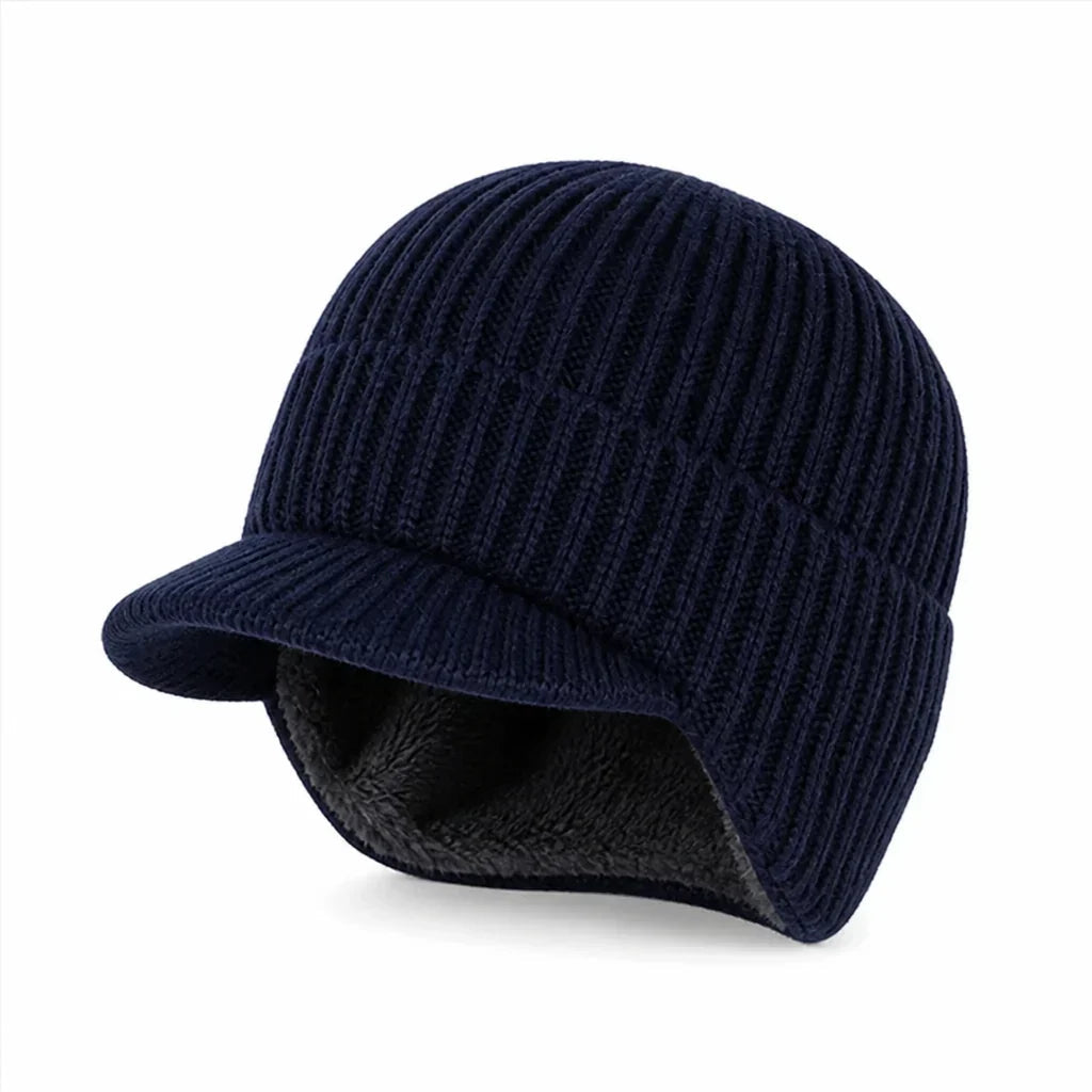 Muts met oorflappen in marineblauw – gebreide muts met klep, donkere fleecevoering zichtbaar