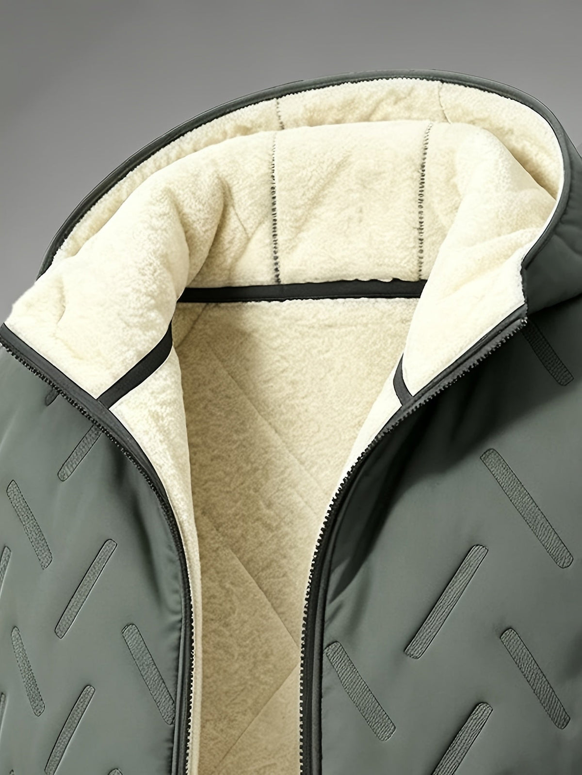 Bodywarmer heren detail: gevoerde capuchon en rits van dichtbij