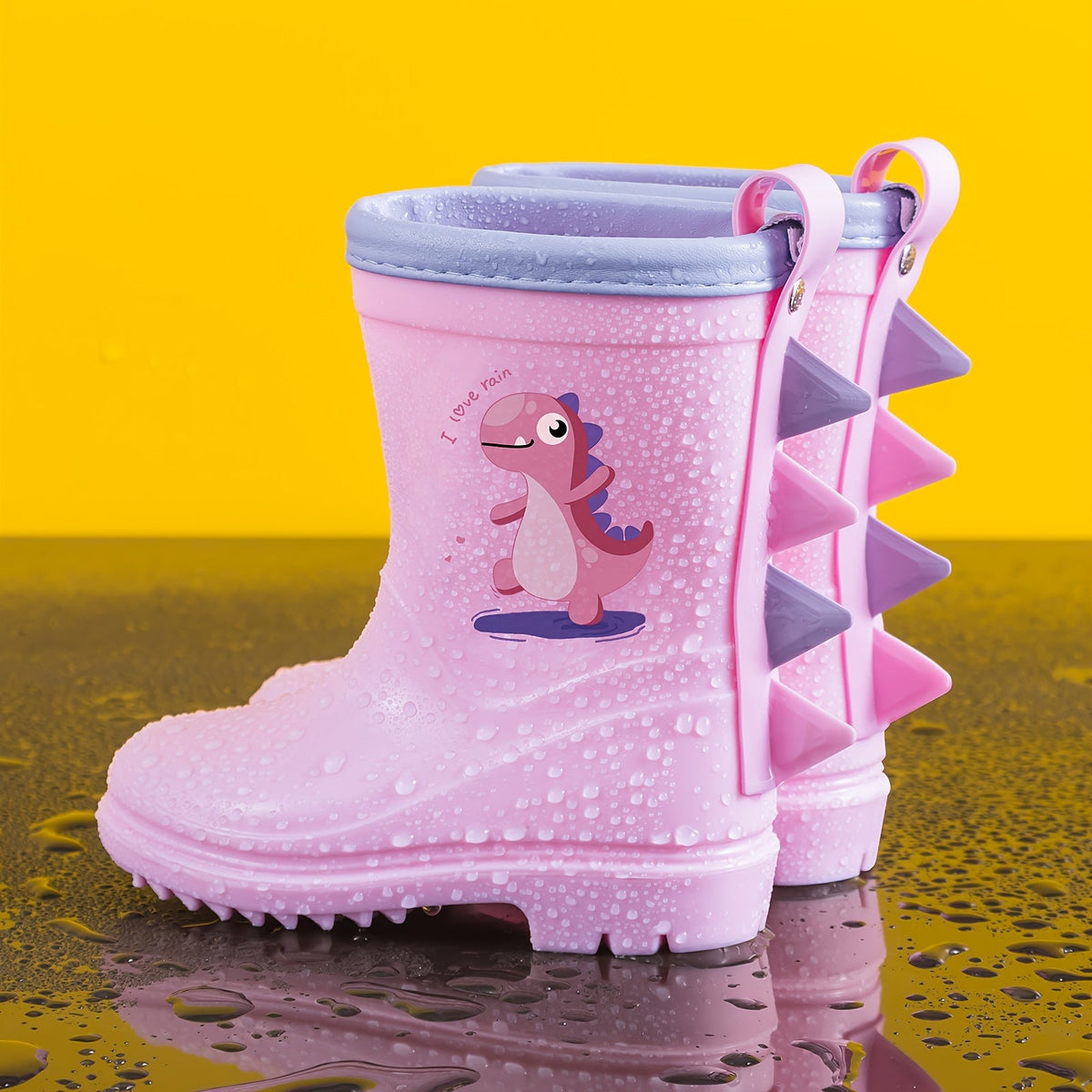 Regenlaarsjes kinderen met dinomotief