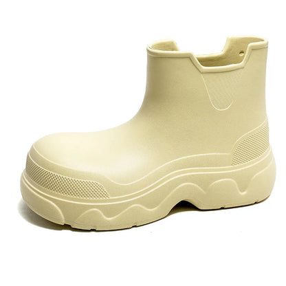 Korte regenlaarzen dames in crème – productfoto op wit, zijaanzicht