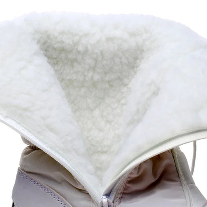 Snowboots dames gevoerd – close-up van de witte teddyvoering