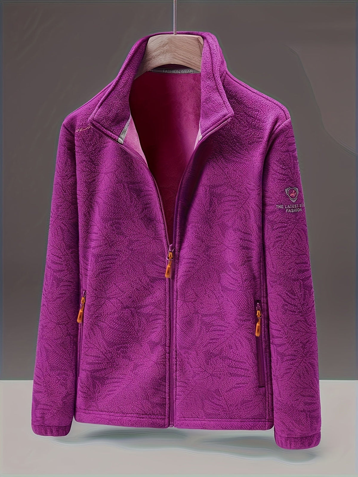 Dames fleece jas met opstaande kraag en bladprint