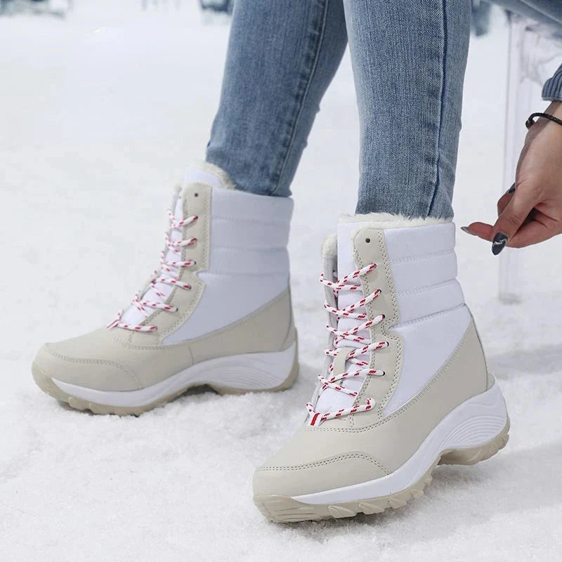 Snowboots dames met plateauzool in zwart en wit