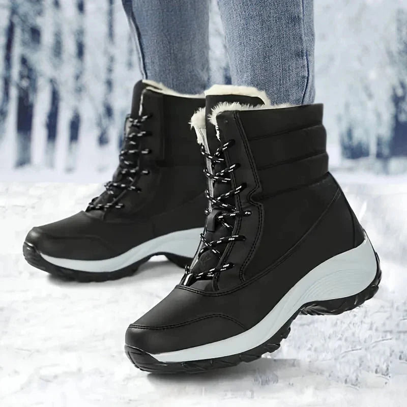 Snowboots dames met plateauzool in zwart en wit