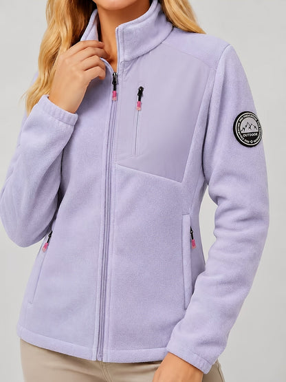Dames fleece jas met opstaande kraag en drie ritszakken