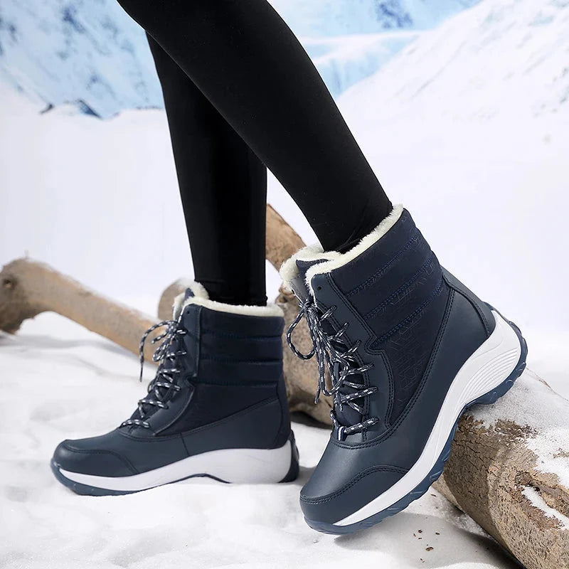 Snowboots dames met plateauzool in zwart en wit
