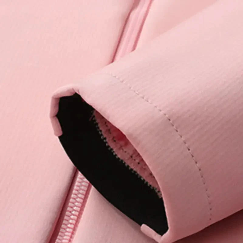 Gevoerde softshell jas dames met capuchon in roze