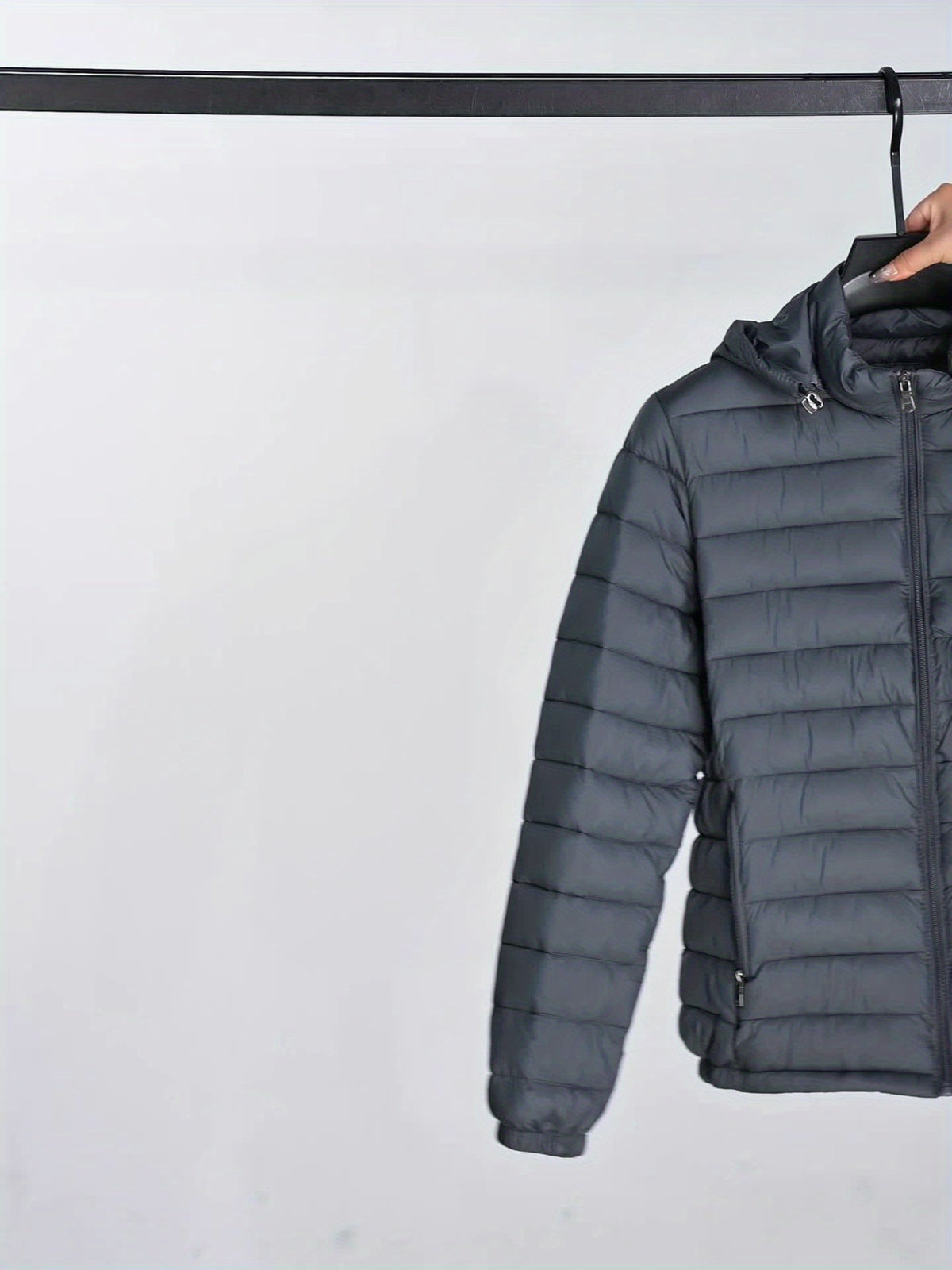 Heren winterjas met capuchon, gewatteerd in het zwart