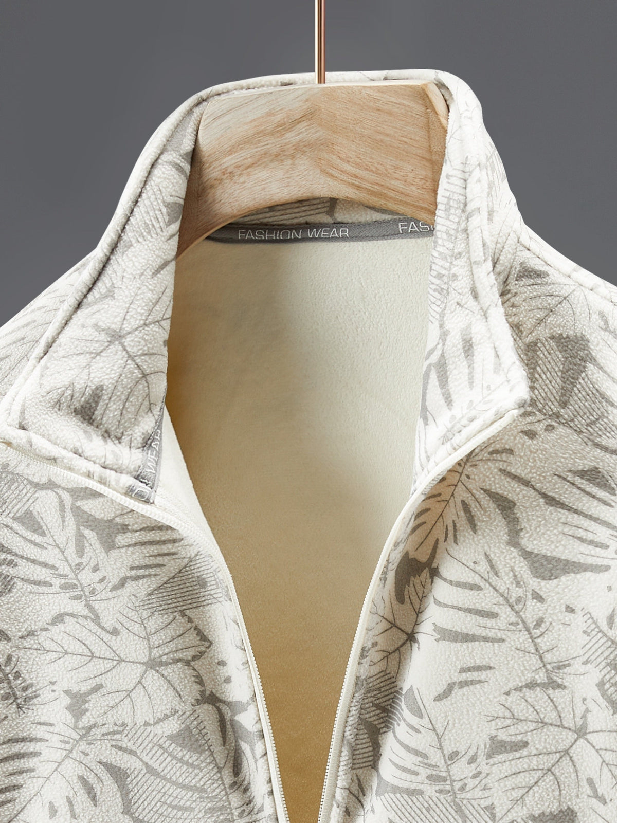 Dames fleece jas met opstaande kraag en bladprint