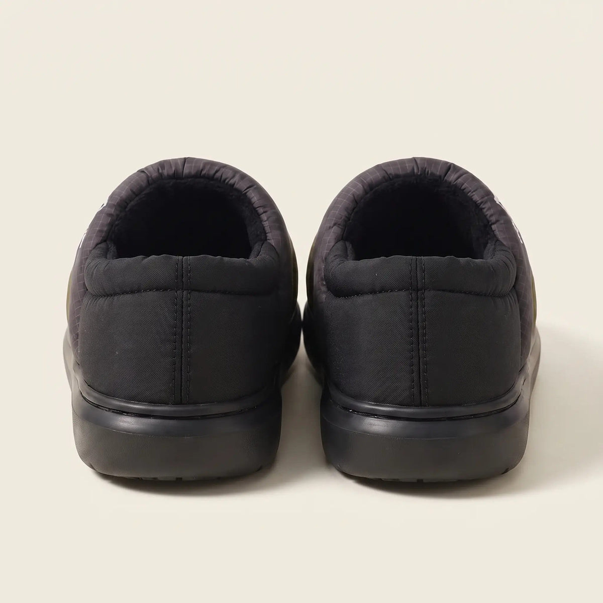 Pantoffels met dichte hiel en buitenzool