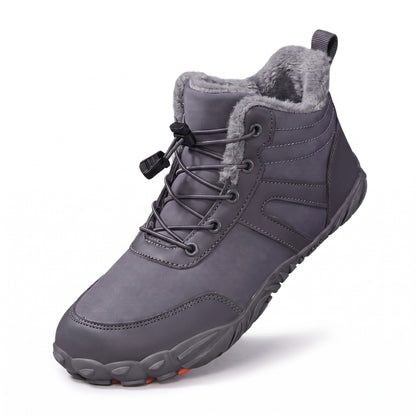 Snowboots dames in grijs met snelsluiting en profielzool op witte achtergrond